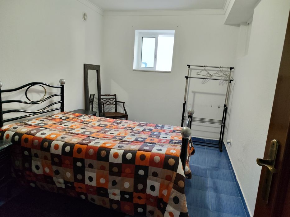 Quarto em Moradia