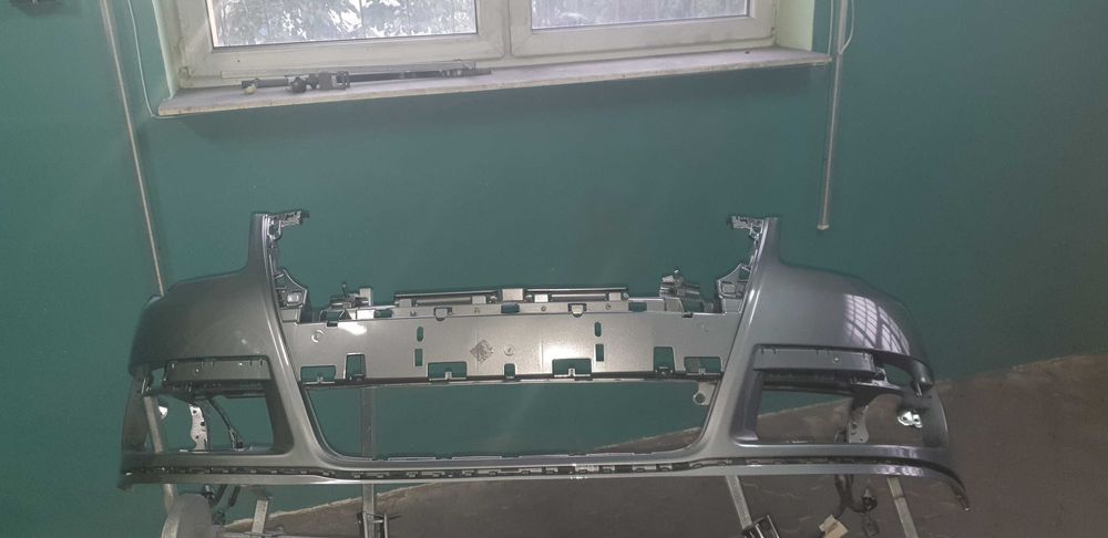 Passat B6 05-10 Zderzak przód LA7W srebrny