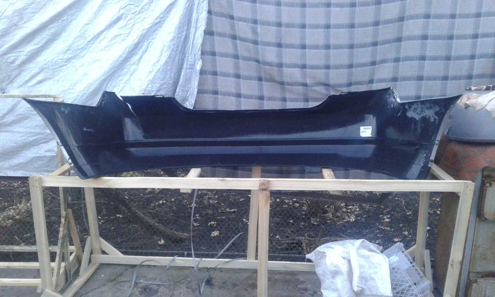 Бампер задний NISSAN Tiida