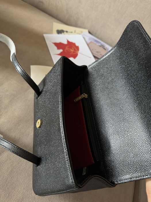 Chanel Clutch With Leather Strap