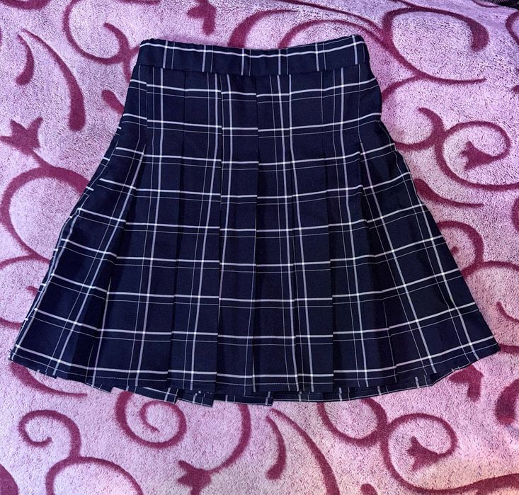 Спідниця в клітинку.