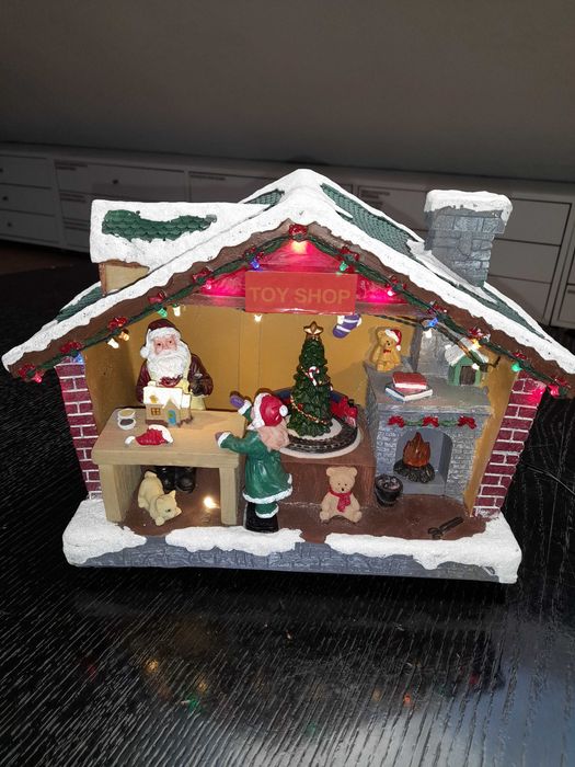 Casa  do Pai Natal em resina com Luz + Musica e Movimento. Usada