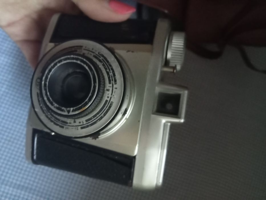 Máquina vintage com bolsa