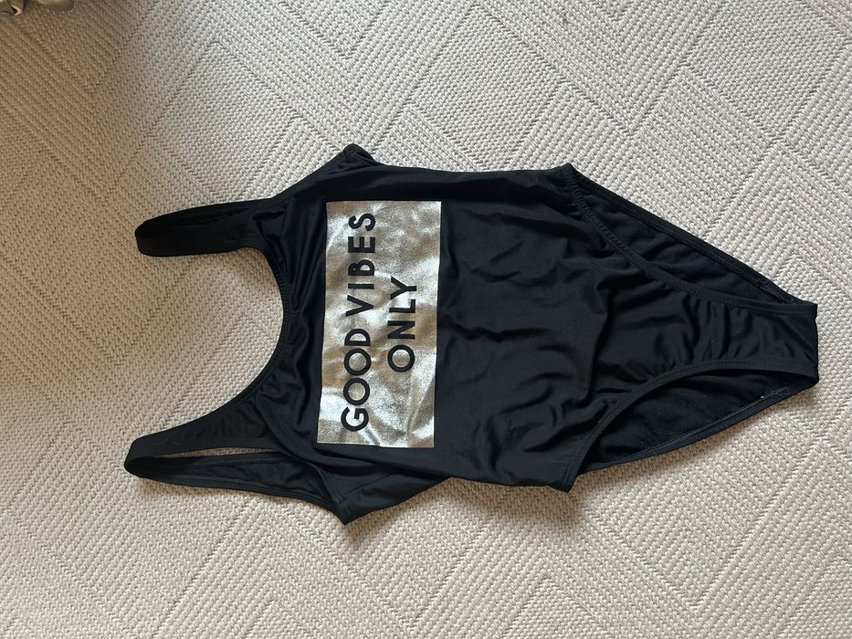 Суцільні купальники adidas