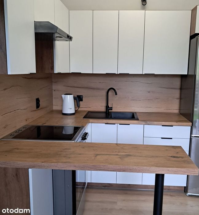 Nowoczesne mieszkanie z ogródkiem w apartamentowcu w Toruniu