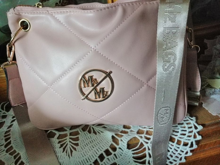 Listonoszka pudrowy roż