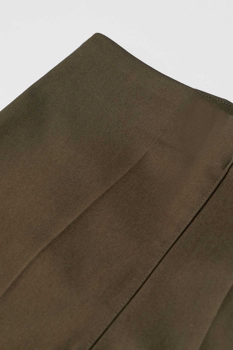 H&M nowe spodnie super stretch khaki r. 36