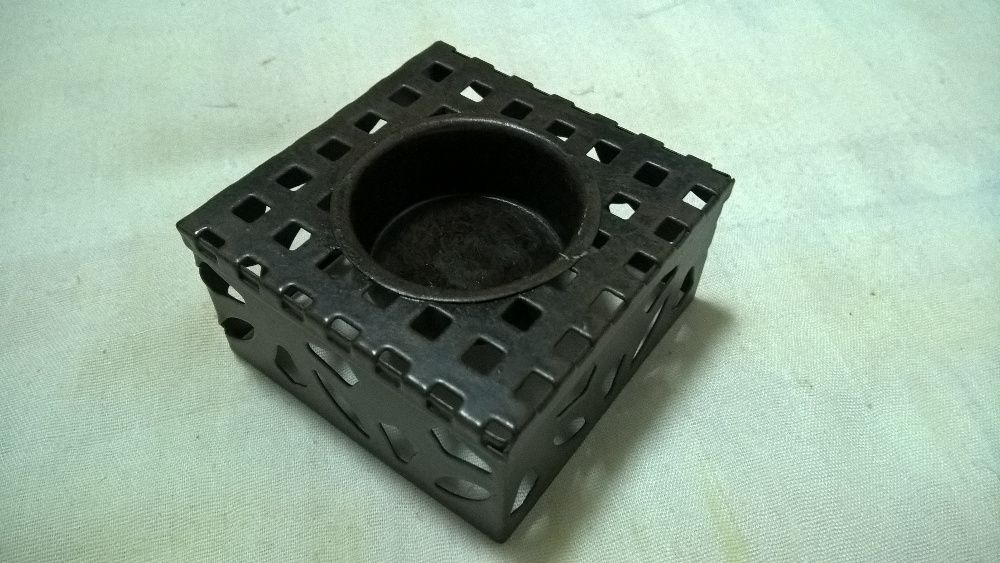 Suporte em metal para vela