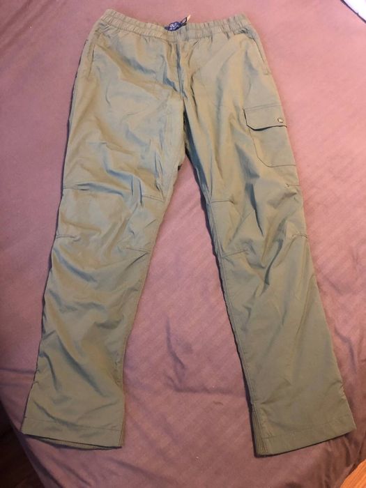 Спортивные Поло ,зеленого цвета ,состояние новых.оригинал .