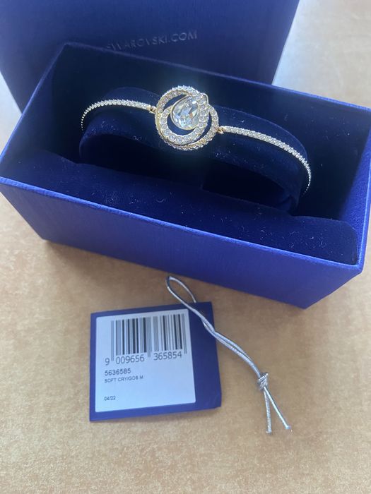 Bransoletka typu bangle w odcieniu złota NOWA Swarovski