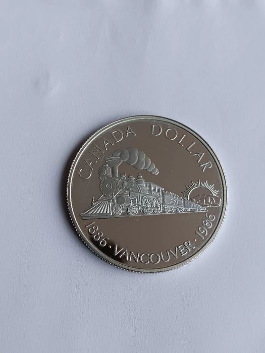 Moeda prata prof dólar. Canadá de 1986.