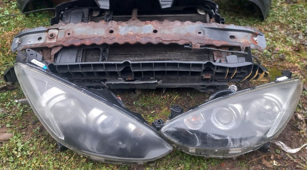 Бампер  радіатори підсилювач телевізор капот крило mazda 2 de lift