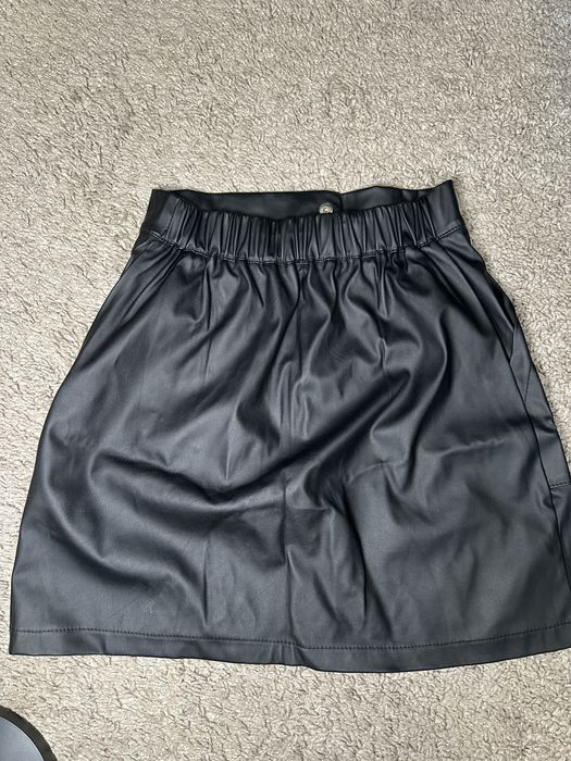 Шкіряна спідниця