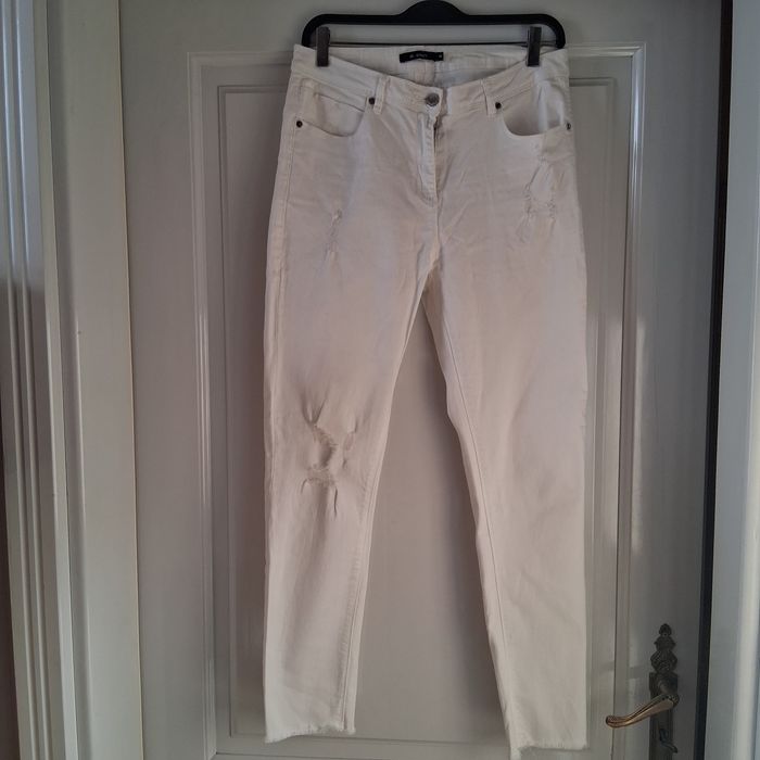 Jeansy białe Monnari