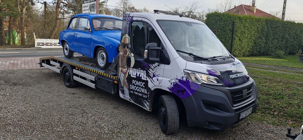 Pomoc Drogowa Holowanie Transport Wymiana koła Odpalanie samochodów