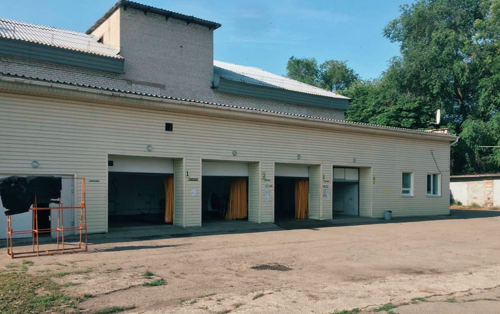Продам  здание с действующим бизнесом,автомойка
