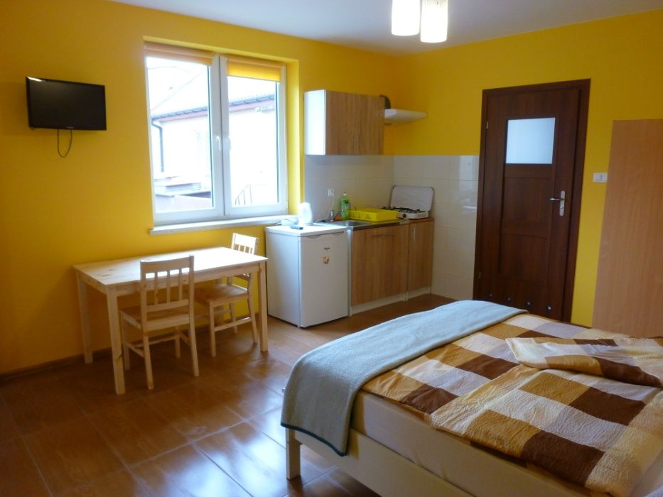 Kwatery pracownicze, noclegi w centrum Uniejowa, faktura