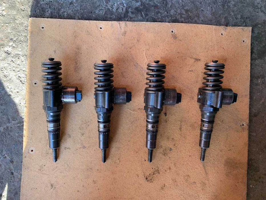 форсунки Volkswagen Golf Caddy Passat B5 Touran 2.0 tdi 03G130073G