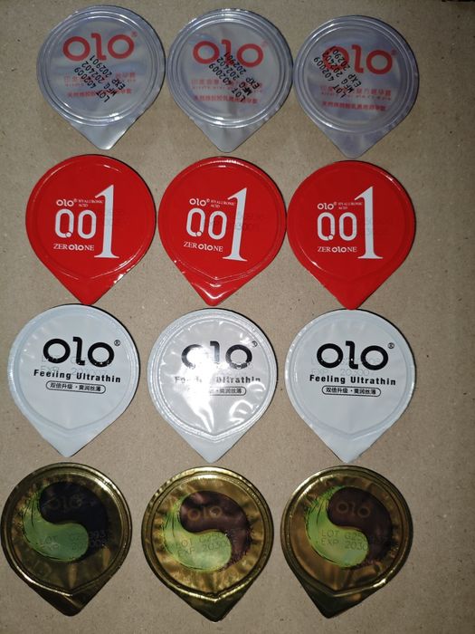 Презервативы Olo 001 . 4 вида презервативы Оло опт розница с гиалуроновой кислотой ультратонкие