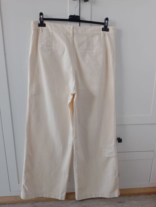 Nowe jeansy szerokie nogawki 44