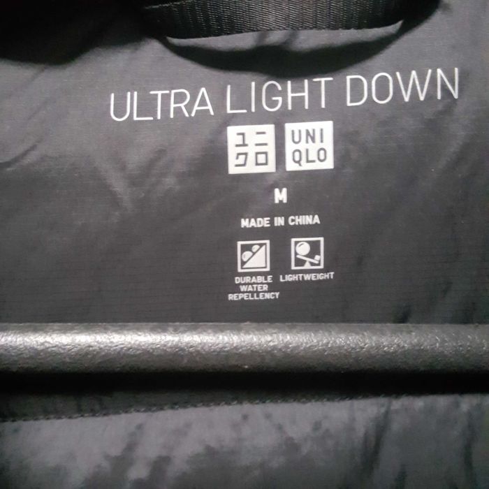 Ультралегка жіноча пухова куртка  з капюшоном UNI QLO   довга.