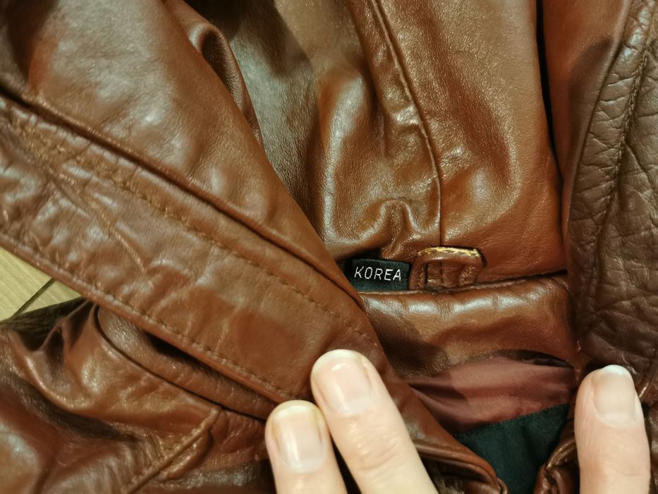 Skórzana kurtka z kapturem 140/146