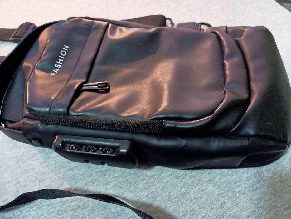 Bolsa mochila tiracolo