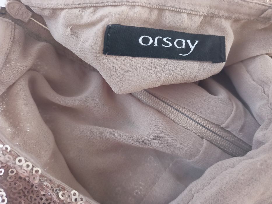 Złota sukienka z cekinów z Orsey