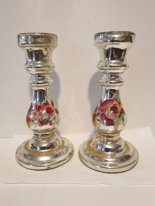 A pair of beautiful antique candlesticks made of silvered and hand-painted glass