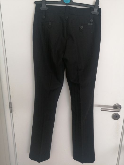 Calças pretas clássicas de mulher da marca Firetrap