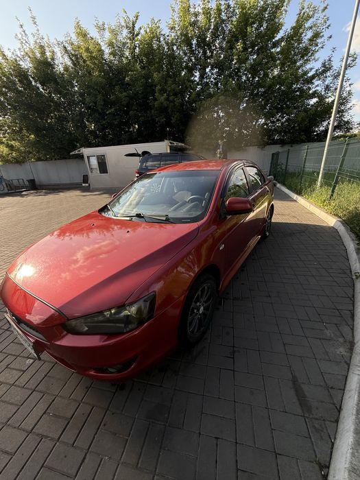 Lancer 10 2011 2.0 автомат / газ