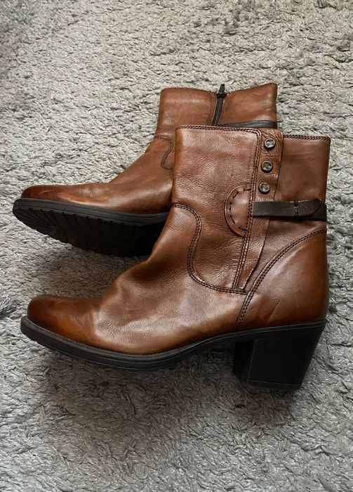 черевики Clarks.