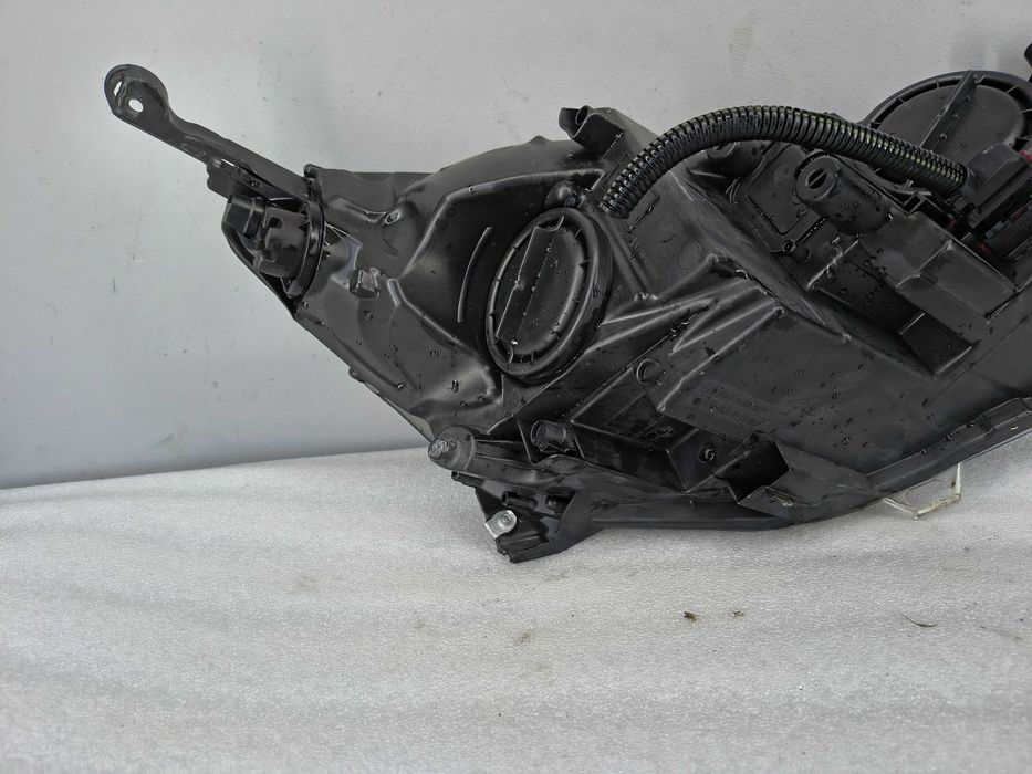 Lampa reflektor Lewy Opel Astra J IV