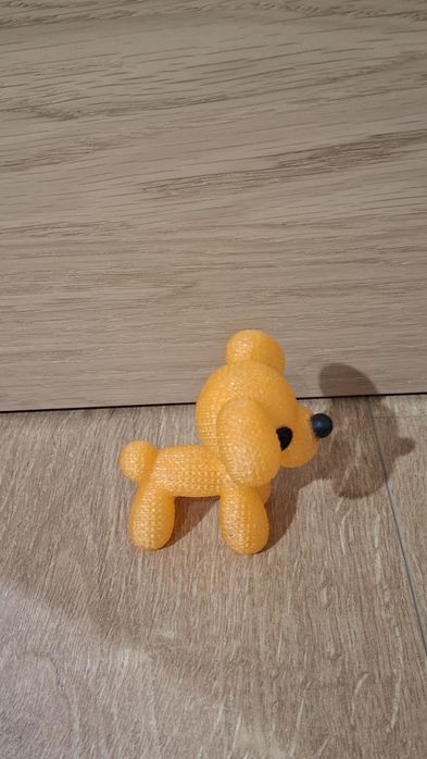 Figurka pomarańczowego pieska. Wydruk 3D