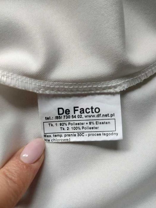 Biała (śmietankowa) bluzka z falbanką na jedno ramię