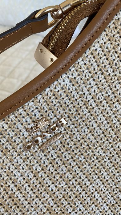Bolsa Coach feminina em tecido tramado