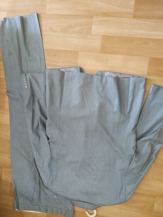 Продам новый костюм мужской на высокий рост 56 размер