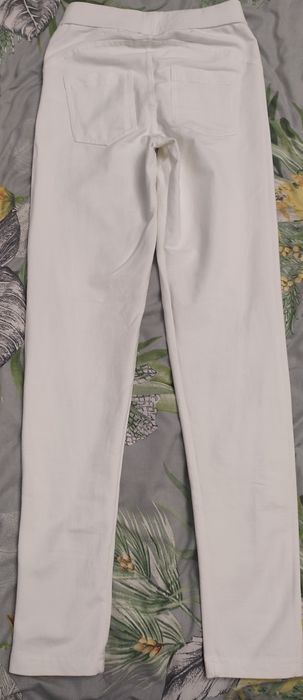 Білі штани жіночі