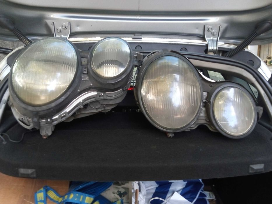 2 jogos de faróis esqº e dtº mercedes mod.E-250TD 1998 estado novos