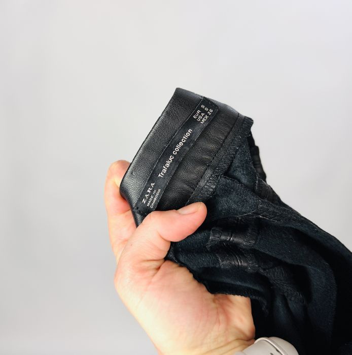 Czarne spodnie skórzane z przeszyciami S 36