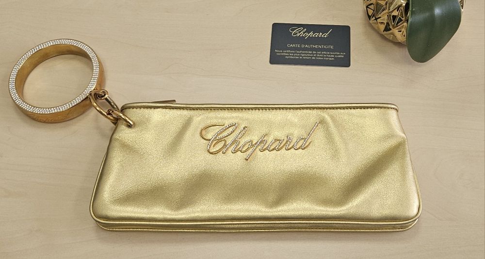 Клатч золотий Chopard