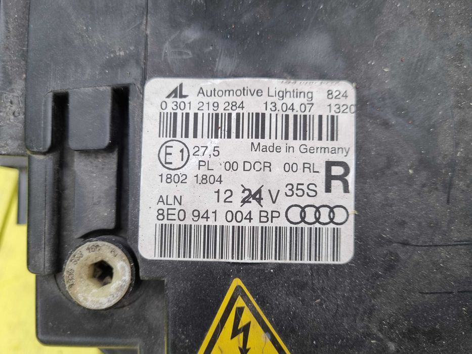AUDI A4 B7 (04-08)- LAMPA Bi XENON skrętny PRAWA i LEWA oryginał AL eu