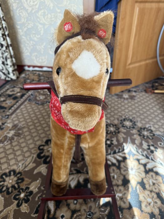 Дитячий коник гойдалка