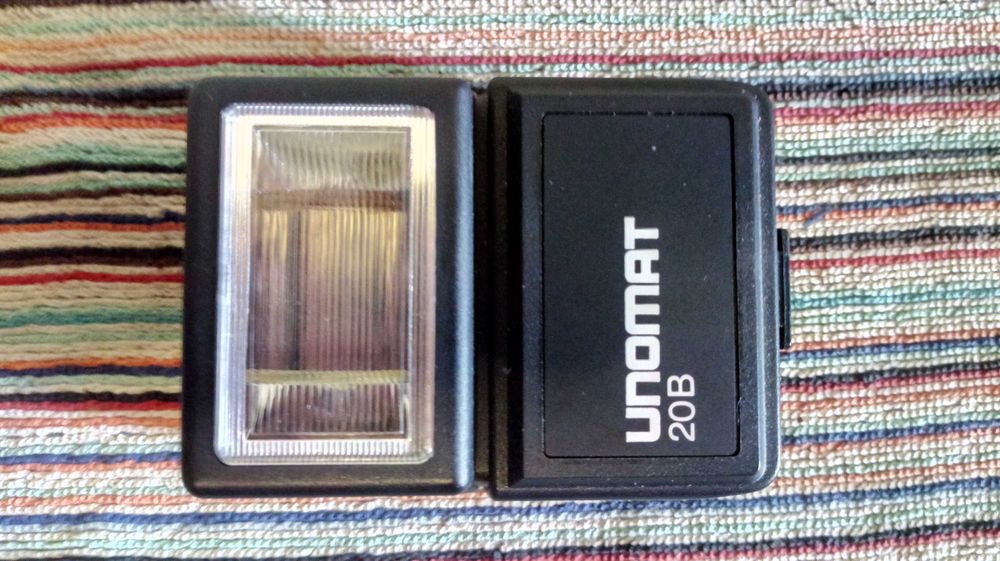 Фотовспышка UNOMAT LZ20 GN66 новая