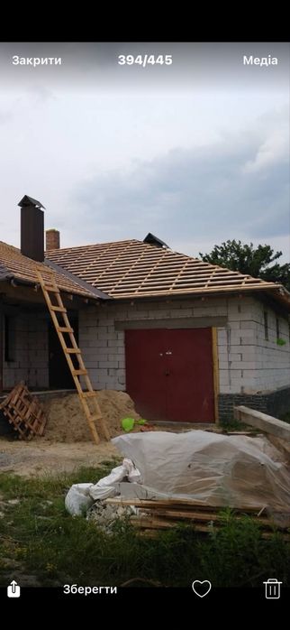 Гаражні ворота розпашні з рамою