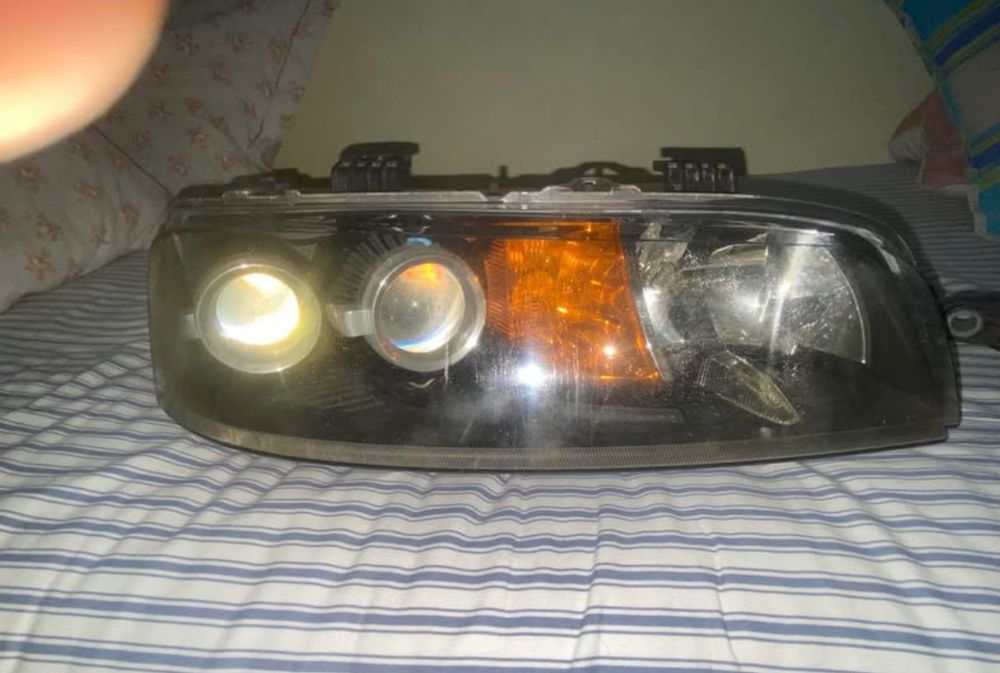Faróis Fiat Punto MK2 com olho de boi
