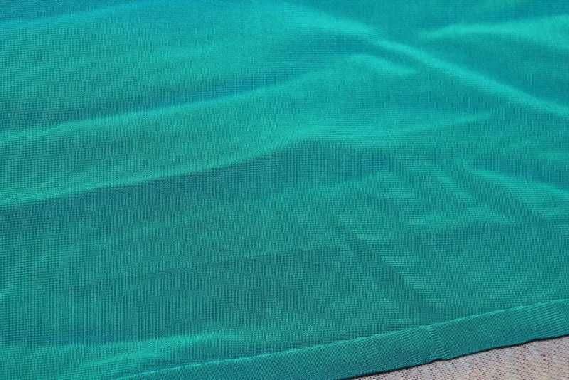 Połyskujący turkusowy golf