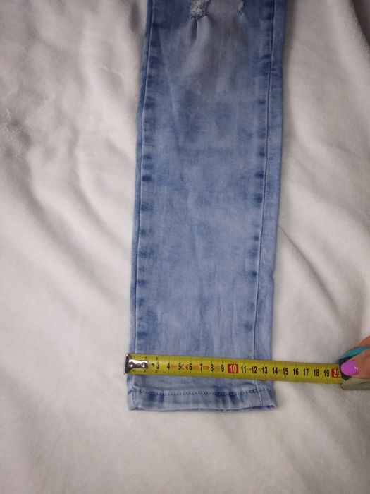 Spodnie jeans 40.        14