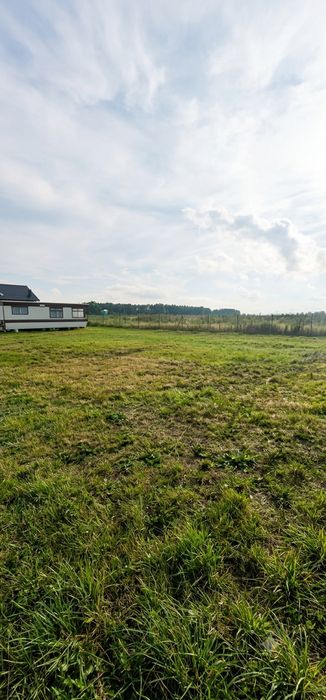 Działka budowlana 1040m2 z domkiem holenderskim i garażem, ogrodzona