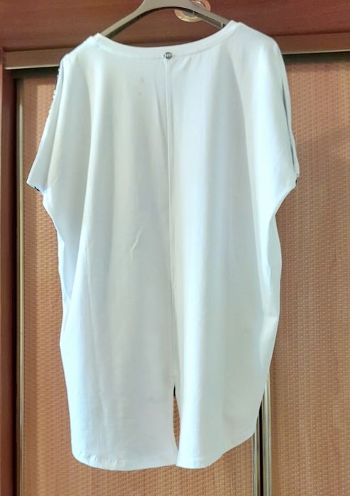 Нова жіноча туніка